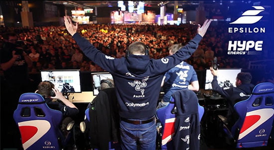 Esport gamers playing in front of the monitors.