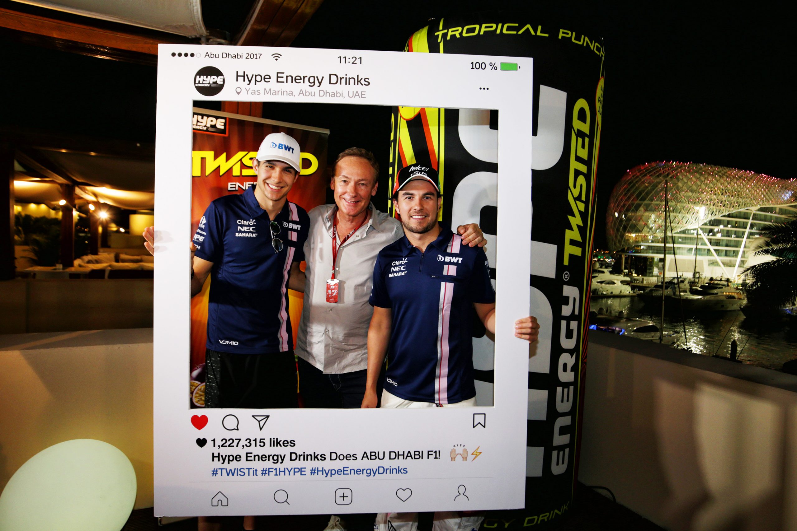F1 drivers on the terrace of the motorhome on the track.