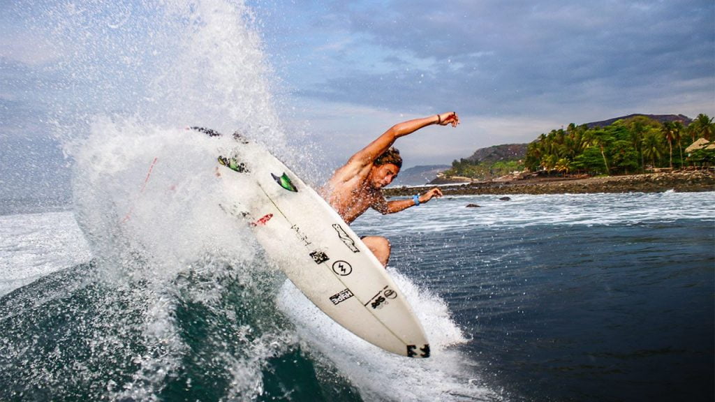 Surfer Bryan Perez, rides on the waves.