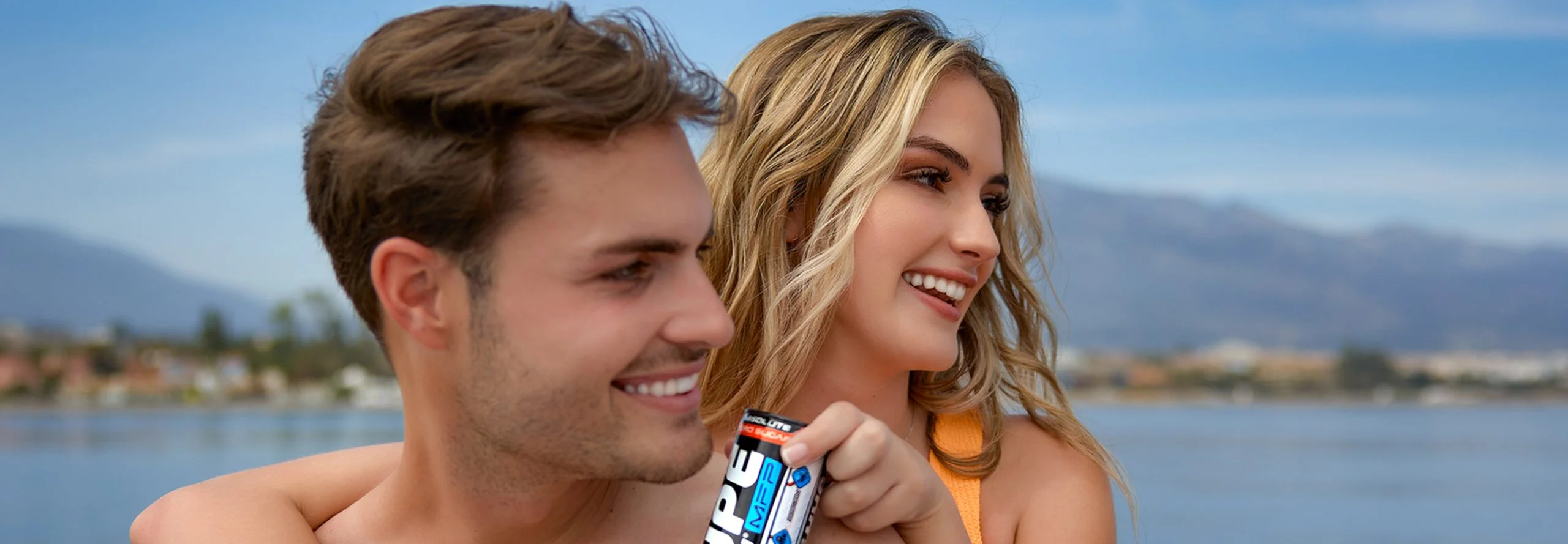 Young couple with hype energy drink.